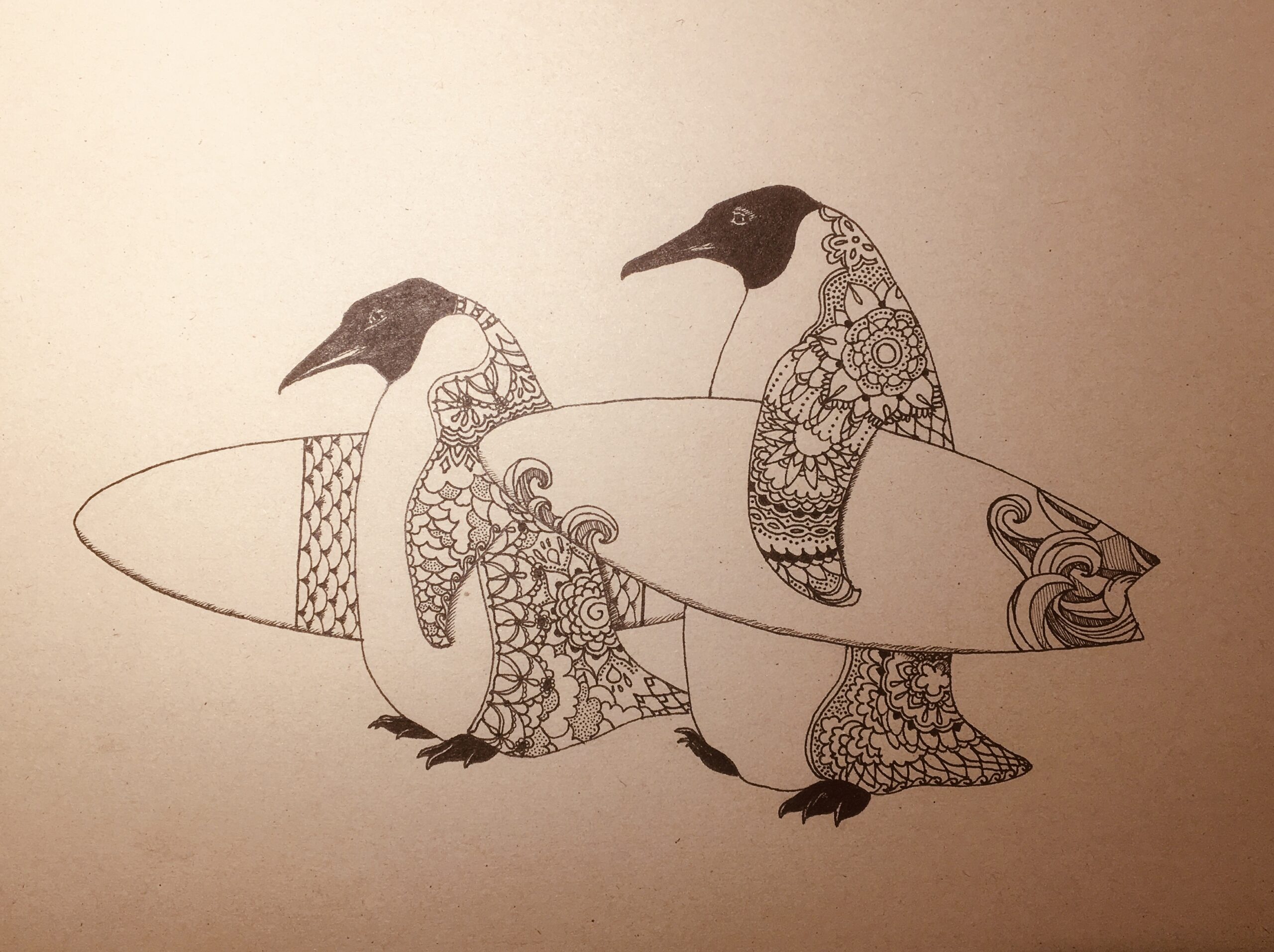 To pingviner med surfboard